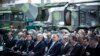 Orbán Viktor, Benkő Tibor akkori honvédelmi miniszter (j4), Palkovics László még innovációs és technológiai miniszterként (j3) és Armin Papperger, a Rheinmetall elnöke a gyár épületének ünnepélyes átadóján a zalaegerszegi ZalaZONE Ipari Parkban 2022. március 26-án