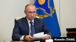 RUSSIA -- Russian President Vladimir Putin addresses a summit of the Collective Security Treaty Organization (CSTO) via a video link at the Novo-Ogaryovo state residence outside Moscow, December 2, 2020.