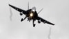 Канадський багатоцільовий винищувач CF-18A приземляється на авіабазі Бірджі на Сицилії. Канадські літаки приєднаються до операції в Лівії через два дні.