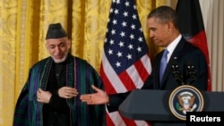 Afghan President Hamid Karzai (left) with U.S. President Barack Obama at a joint news conference at the White House in January.