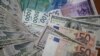 Валютная диверсия против сома?