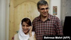 نسرین ستوده همراه با همسرش رضا خندان