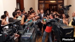 Armenia - TV and other journalists interview an opposition leader in Yerevan.