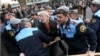 Armenia -- Riot police detain activist Shant Harutiunian in downtown Yerevan, 5 November, 2013
