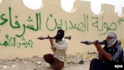 شبه نظامیان سپاه مهدی در بصره.
عکس از (epa)