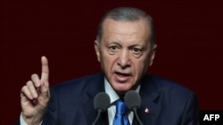 Turkish President Recep Tayyip Erdogan delivers a speech during the 2023-2024 Academic Year Opening Ceremony at the Bestepe People's Congress and Culture Centre in Ankara on October 9, 2023. (Photo by Adem ALTAN / AFP)