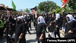 A spokesman for a Shi'ite organization said that the grenade was hurled into the crowd attending an Ashura procession in which Shi'a Muslims mourn the 7th-century death of Prophet Muhammad’s grandson, Hussein. (file photo)