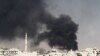 Syria -- Smoke rises from the eastern Damascus suburbs of Arbeen, after what activists say was an airstrike by a MIG fighter jet, 08Nov2012