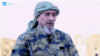 Abu Amina, the veteran militant in the Uzbek recruitment video, emphasizes that he has brought his family with him to wage "jihad".