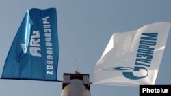 Armenia -- The flags of the ARG national gas operator and its dominant Russian shareholder, Gazprom.