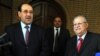Yragyň prezidenti Jalal Talabani (sagda) we premýer-ministri Nuri al-Maliki