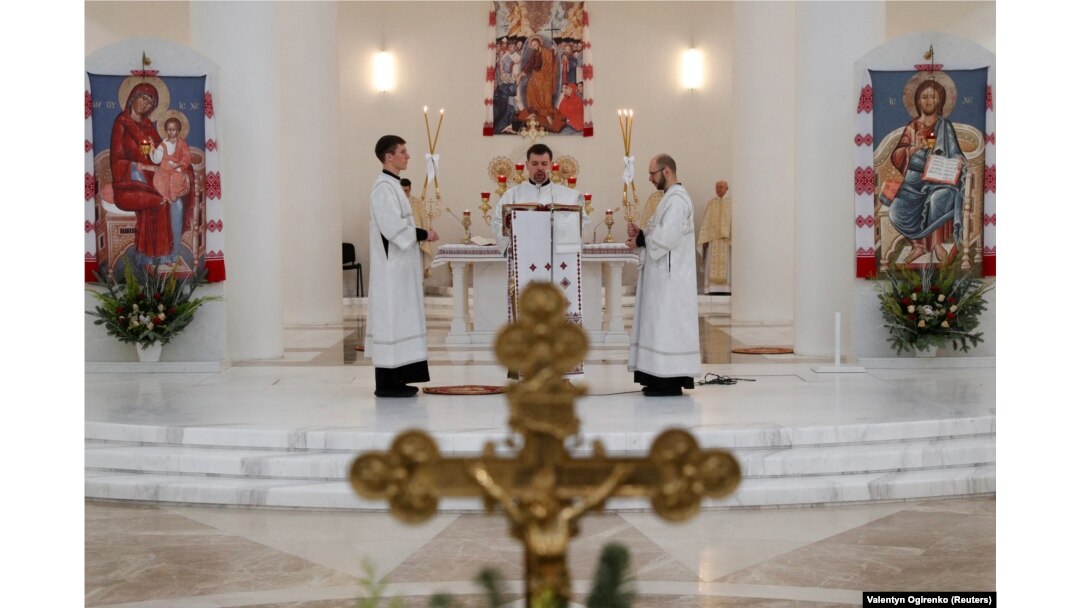 Prayers And Weapons: Ukraine Prepares As World Holds Breath