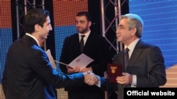 Armenia -- Henrikh Mkhitaryan is honored by President Serzh Sarkisian as Armenia's best football player of 2011, Yerevan, 15Dec2011