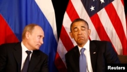 Президент России Владимир Путин (слева) и президент США Барак Обама в Лос-Кабосе, июнь 2012 года.