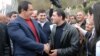 Armenia - Prosperous Armenia Party leader Gagik Tsarukian (L) campaigns in Dilijan, 17Apr2012.