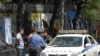 Armenia -- Traffic police fine a driver in Yerevan, undated.
