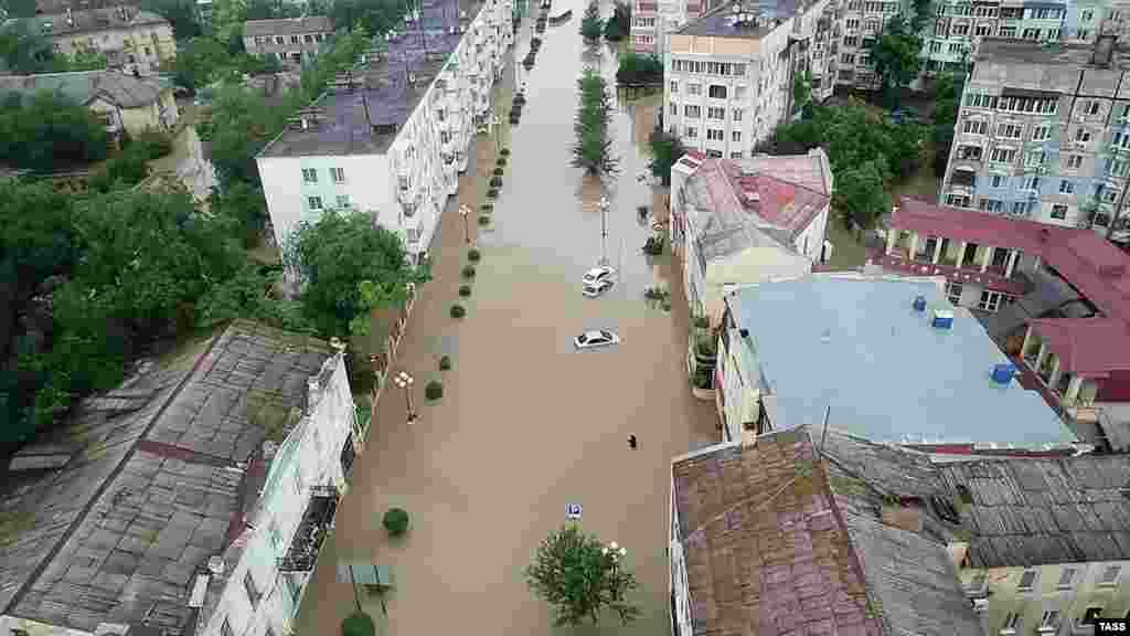 A flooded street in Kerch. Local meteorologists said the amount of rainfall on June 17 was double the expected amount for the whole month in eastern regions of the peninsula.