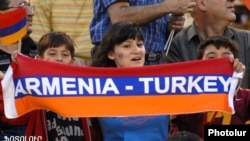 Football fans at Yerevan's Hrazdan stadium pictured during the Armenia-Turkey match on September 6, 2008.