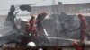 Armenia - Armenian emergency employees work at the Surmalu market in Yerevan partly demolished by an explosion, August15, 2022. 