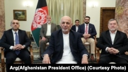 Flanked by his vice presidents and key advisers Afghan President Ashraf Ghani addressed the nation on March 24.