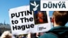 Halkara Adalat Kazyýetiniň binasynyň daşyndaky protestçiler Russiýanyň lideri Wladimir Putiniň tussag edilmegini talap etdiler. Haaga, Hollandiýa, 2024-nji ýylyň 7-nji maýy