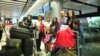Armenia -- A Syrian Armenian family from Aleppo at Yerevan airport. 25Oct2016. 