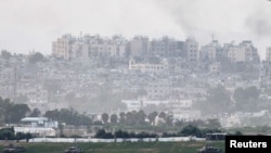 Tancurile israeliene în interiorul Fâșiei Gaza, văzute din Israel.